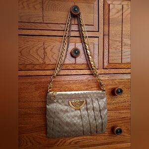 Guess fabric handbag with heavy duty metal straps, front metal logo